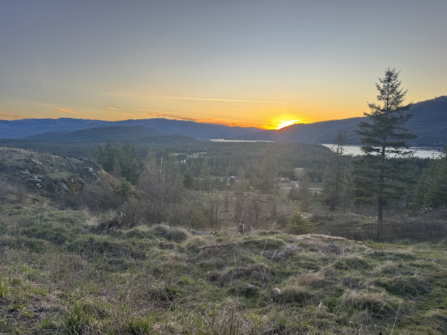 North Idaho sunset over forest and mountains